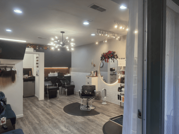Modern salon with stylish decor and comfortable seating for clients.