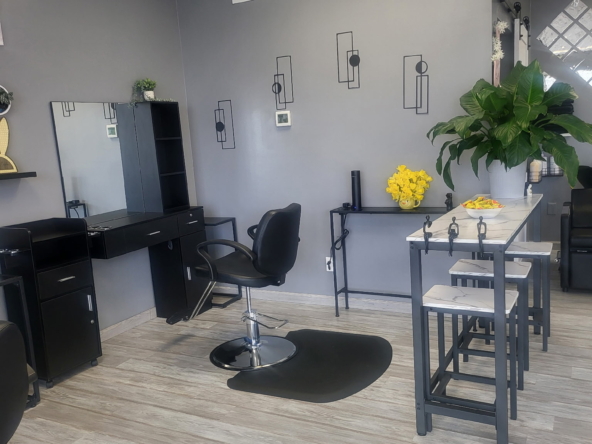 Stylish and minimalist salon interior featuring established styling stations and contemporary decor. Ideal for salon renters and beauty professionals.