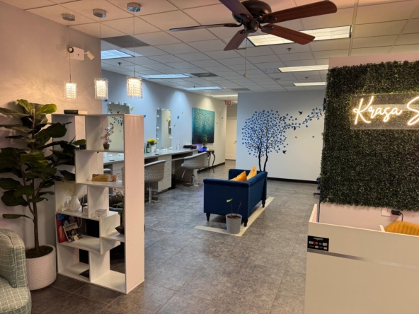 Comfortable hair salon with relaxing ambiance, mirrors, and stylish decor.