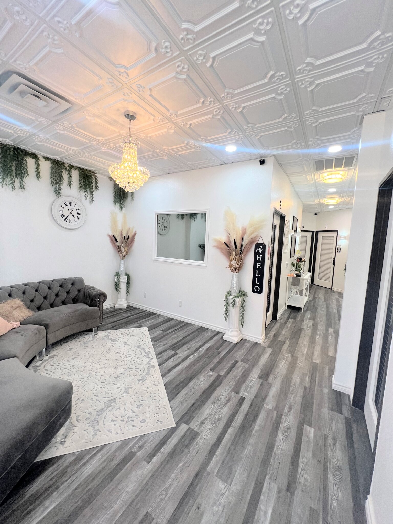 Elegant salon reception area with modern decor and stylish lighting, perfect for beauty and hair salon businesses.