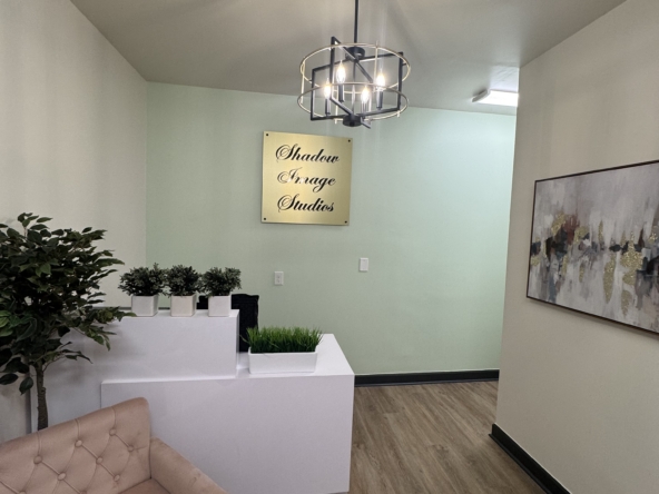 Modern salon reception area with contemporary lighting and stylish decor.