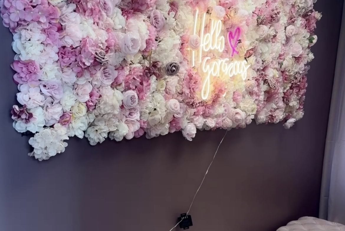 Spring flower wall with pink and white blooms for salon decor.