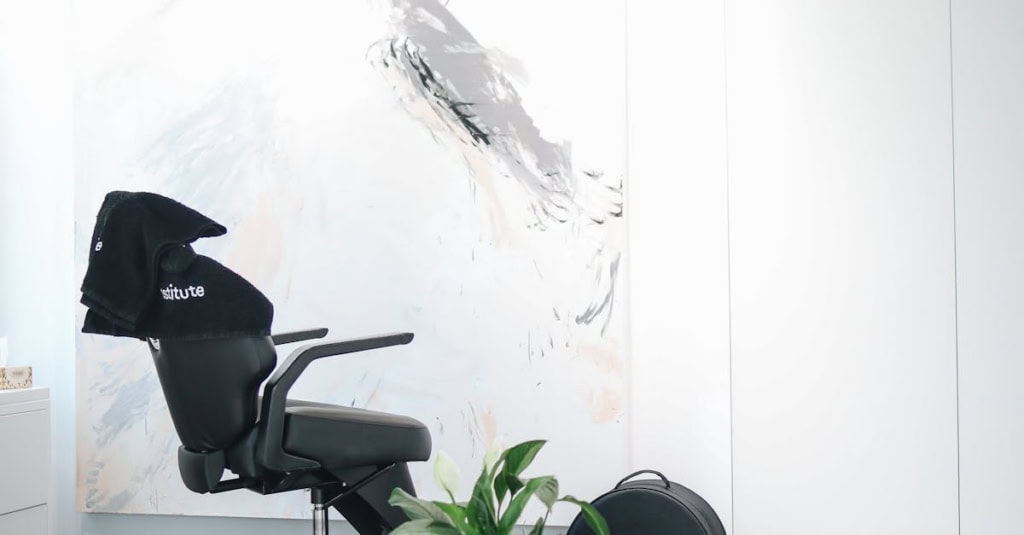 Salon chair in a contemporary hair salon environment for hair styling and beauty services.
